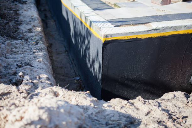 Professional Basement Waterproofing technician working in Hibernia, NJ